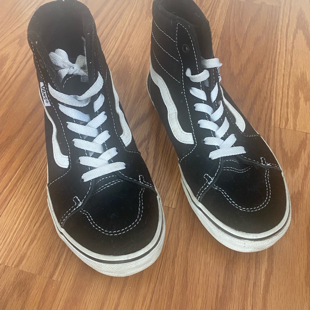 Vans hightop sneakers.  Youth size 4.  Great condition.